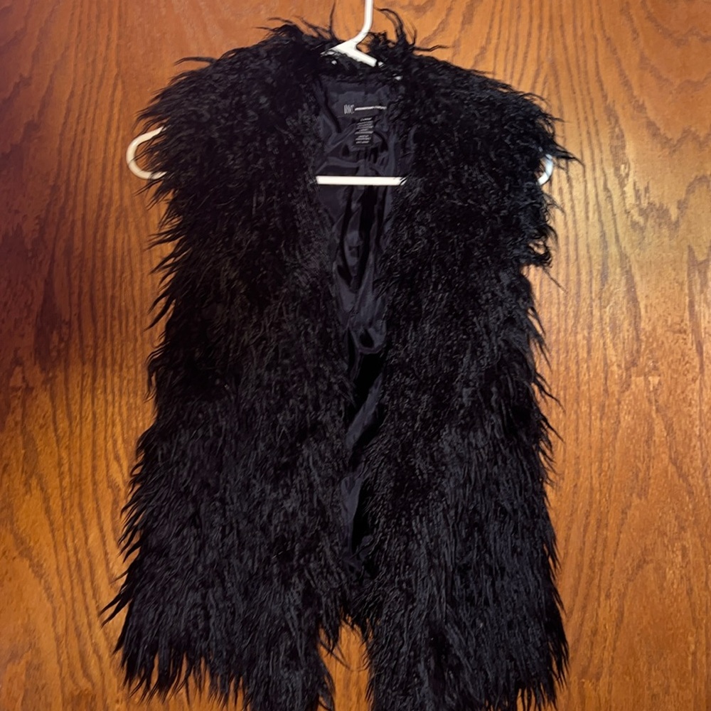 Inc International Concepts size large furry vest.